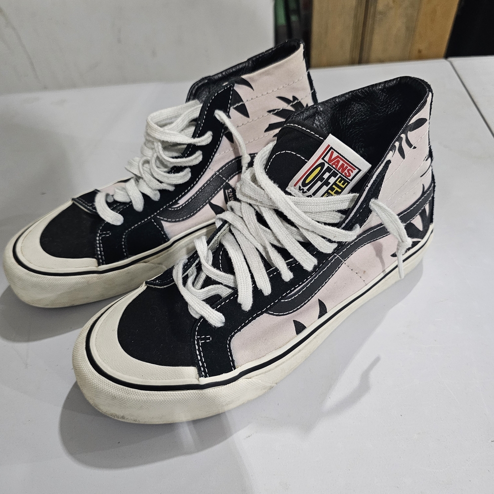Vans Women's Black and White High-Top Sneakers